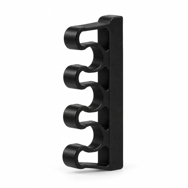 Black KOKO pegboard cable comb with three open cable channels on a white background.