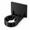 Black KOKO pegboard watch charging puck holder with an empty circular recess and cable channel on a white background.